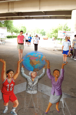 Ashley and viewers on street painting