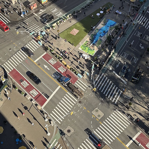 Anamorphic Street Art – Overhead View Aerial photograph of the Disney Lakeshore Lodge anamorphic street art installation at Flatiron Plaza in Manhattan.